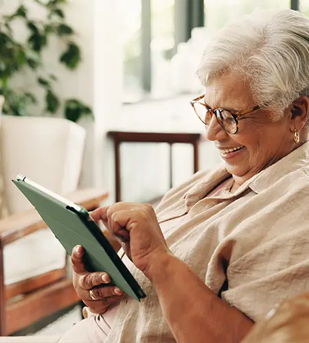 Senior on tablet