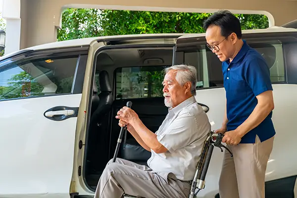 Man providing transportation to senior